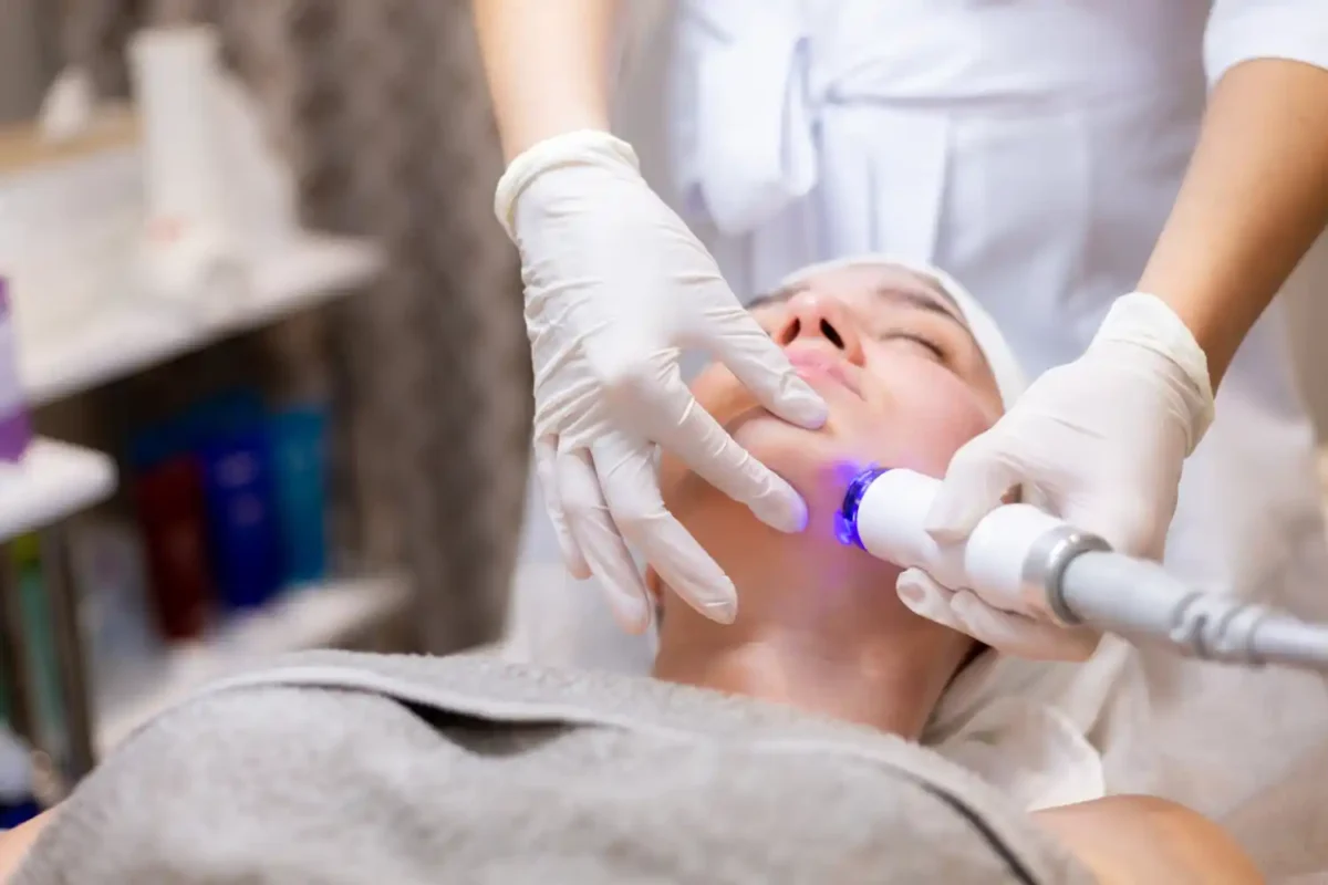 Woman with clear skin after laser thread vein removal treatment